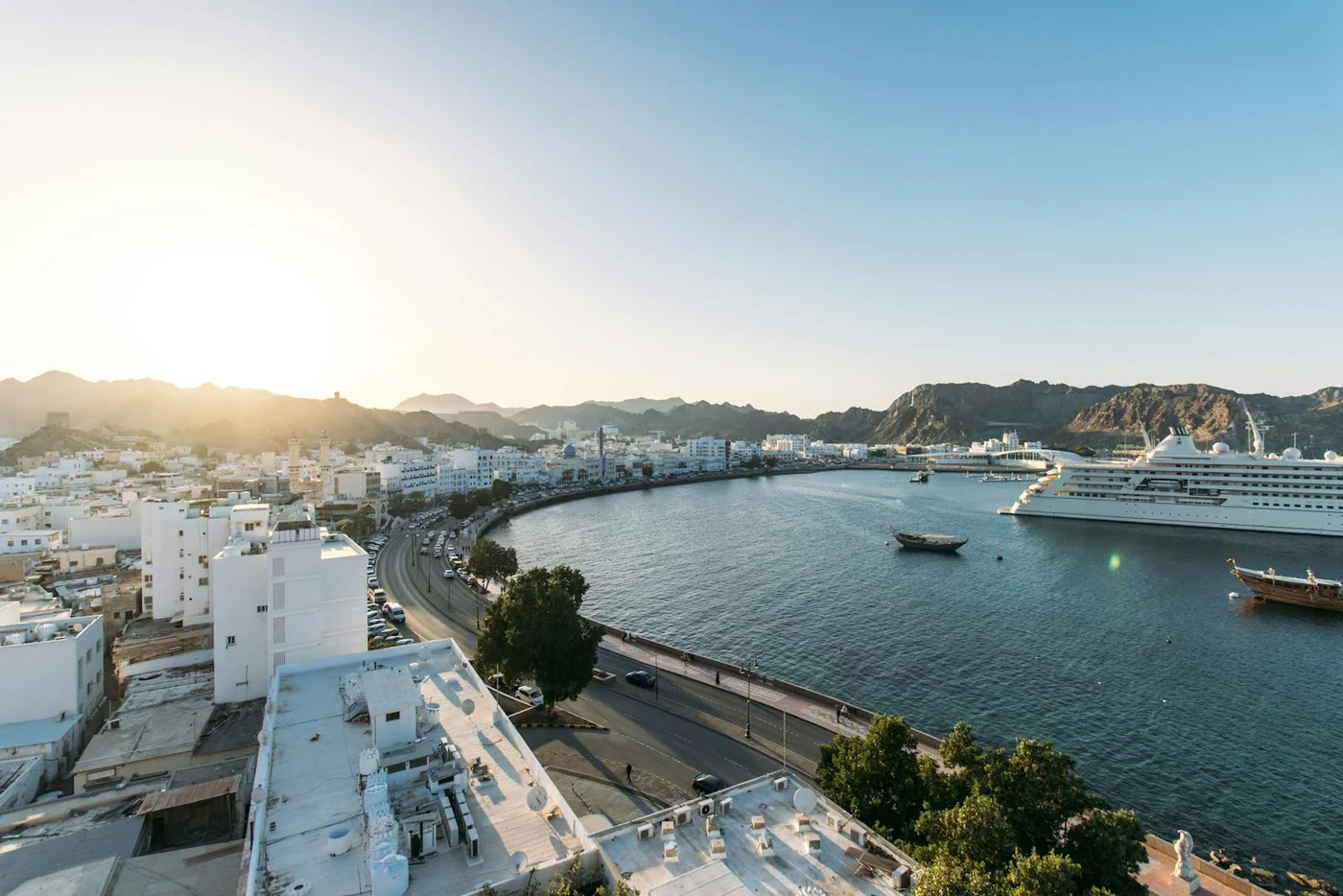 Muttrah harbour and the Muscat waterfront at sunset, Oman.